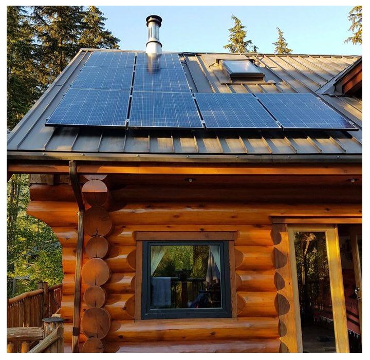 Solar panels on the roof of a cottage