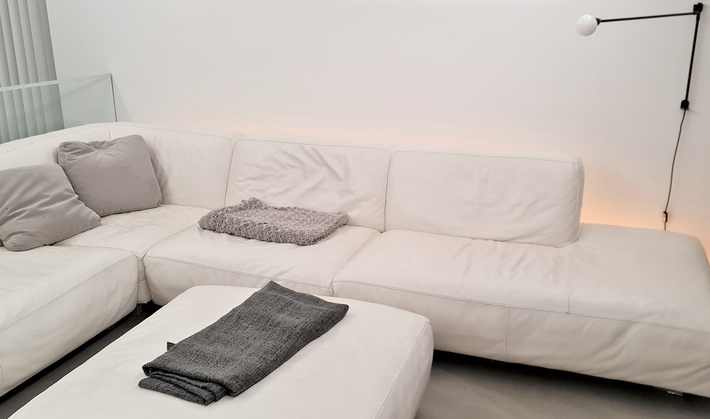 Led ribbon on furniture behind the sofa