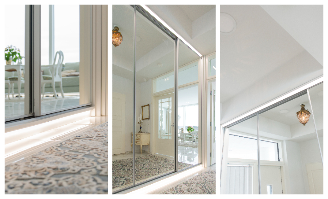 Three vertical images showcase a bright and elegant interior featuring large mirrors, classic furniture, and a patterned rug. Sunlight and stylish LED wardrobe lighting highlight the white walls, while a vintage chandelier hanging from the ceiling adds a refined touch to the atmosphere. - LedStore The hallway sliding door wardrobe is lit with LED strips both from above and below.